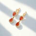 Aretes de Aza Bañados en Oro con Gotas Rojas y Circones