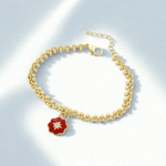 Pulsera Dorada con Dije de Flor Roja Esmaltada