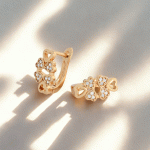 Aretes de Aza con Corazones y Circones Bañados en Oro