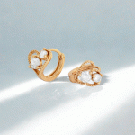 Argollas Huggies Corazón Hueco con Circones Bañadas en Oro