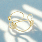 Pulsera Corazones Entrelazados Bañada en Oro