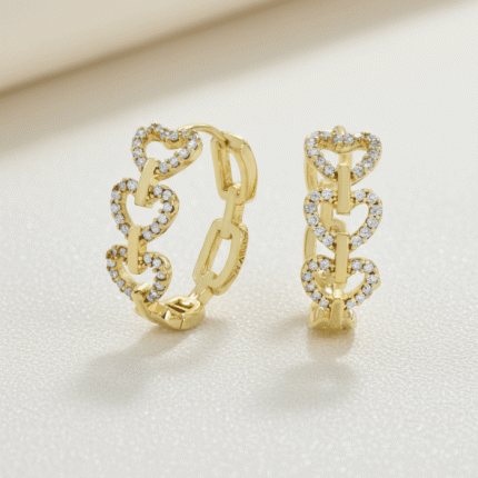 Argollas Huggies Corazones Enlazados con Circones Bañadas en Oro