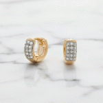 Argollas Huggies para Niñas Bañadas en Oro con Tres Hileras de Circones