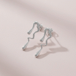 Aretes Estilo Derretido Bañados en Plata – Diseño Moderno y Único