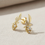 Aretes Rama Floral Bañados en Oro con Circones Brillantes