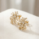 Aretes "Destello Estelar" en Baño de Oro con Perlas y Circones