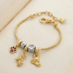 Pulsera de Dijes Bañada en Oro – Diseño de Osito, Conejito y Huella