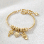 Pulsera de Cadena Bañada en Oro con Dijes de Corazón, Paraguas y Trompa