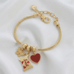 Pulsera Bañada en Oro con Dijes de Corazón, Mariposa y Caramelo "Sweet"