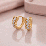 Argollas Huggies de Corazones Bañadas en Oro con Circones