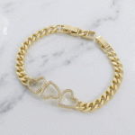 Pulsera Cadena Grumet con Tres Corazones en Pavé de Circones en Baño de Oro