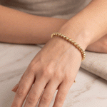 Pulsera Ajustable de Esferas Diamantadas en Baño de Oro - Imagen 2