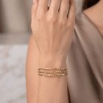 Pulsera de Triple Banda Retorcida en Baño de Oro - Imagen 2