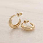 Semi Argollas Bañadas en Oro de Silueta Abombada con Acabado Liso Pulido