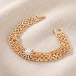 Pulsera Ancha Multicapa de Malla Entrelazada en Oro con Dije Sol de Perla y Circones