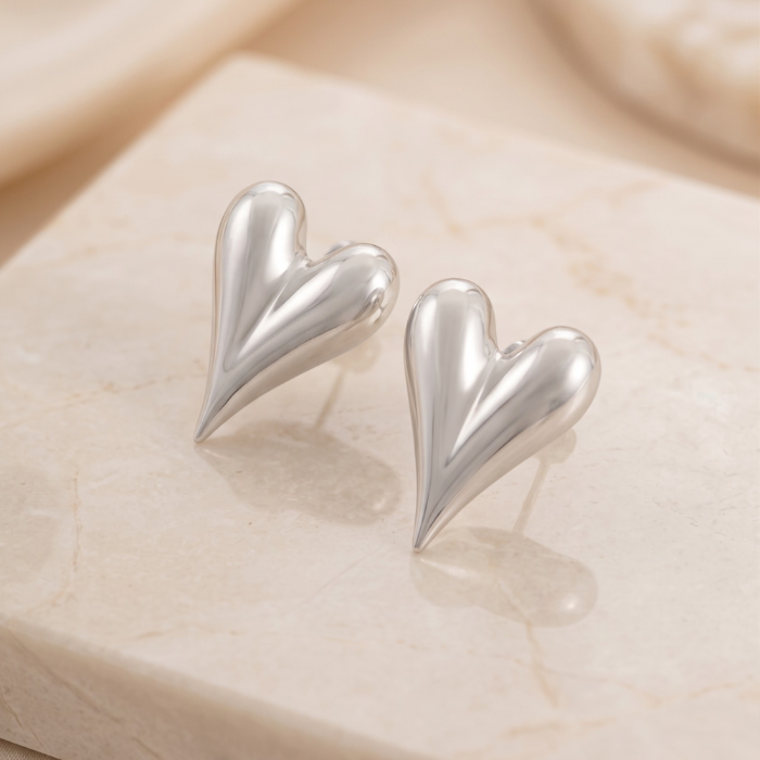 39 Aretes de Corazón Abombado Estilizado Bañados en Plata - Imagen 1
