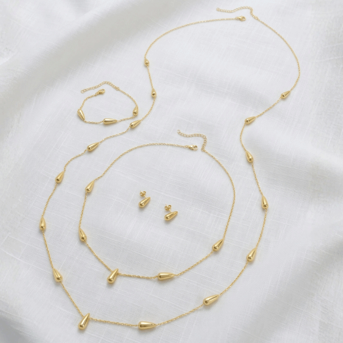 145 Juego de Joyería Gotas Doradas en Baño de Oro (2 Collares, Pulsera y Aretes) - Imagen 1