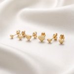 Set Combo de 3 Pares de Aretes Bañados en Oro Corazones Lisos Graduados