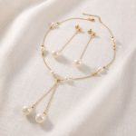Juego de Collar Estilo Corbatín y Aretes Largos Bañados en Oro con Perlas Nacaradas