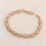 Pulsera Articulada de Cuentas Cilíndricas en Pavé de Circones Bañada en Oro para Dama