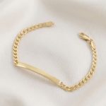 Pulsera de Cadena Barbada con Placa Esclava Lisa Bañada en Oro para Dama